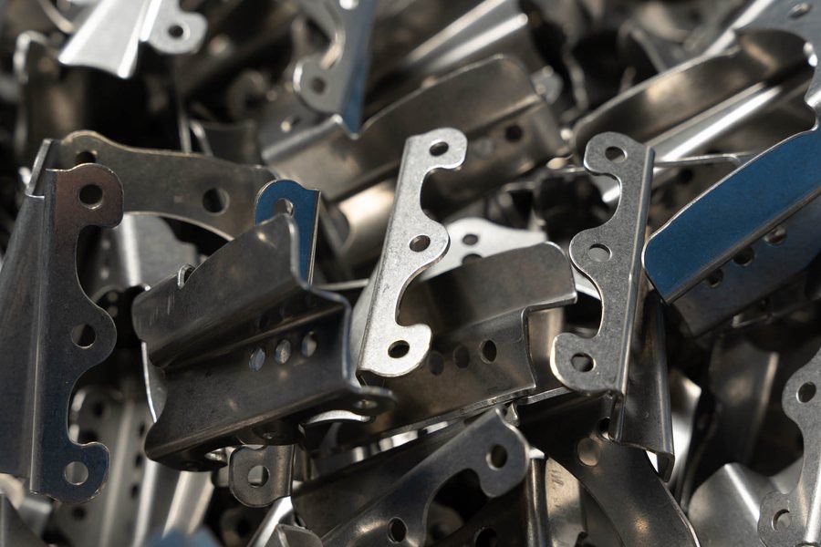 Stamped brackets in bulk after production