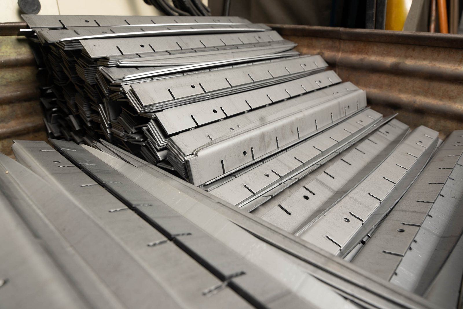 Long formed channel parts after stamping