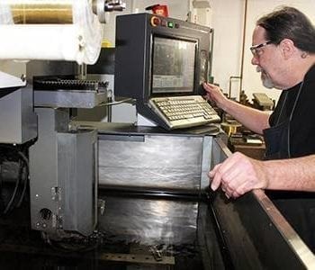 metal cutting Frontier Metal Stamping Denver